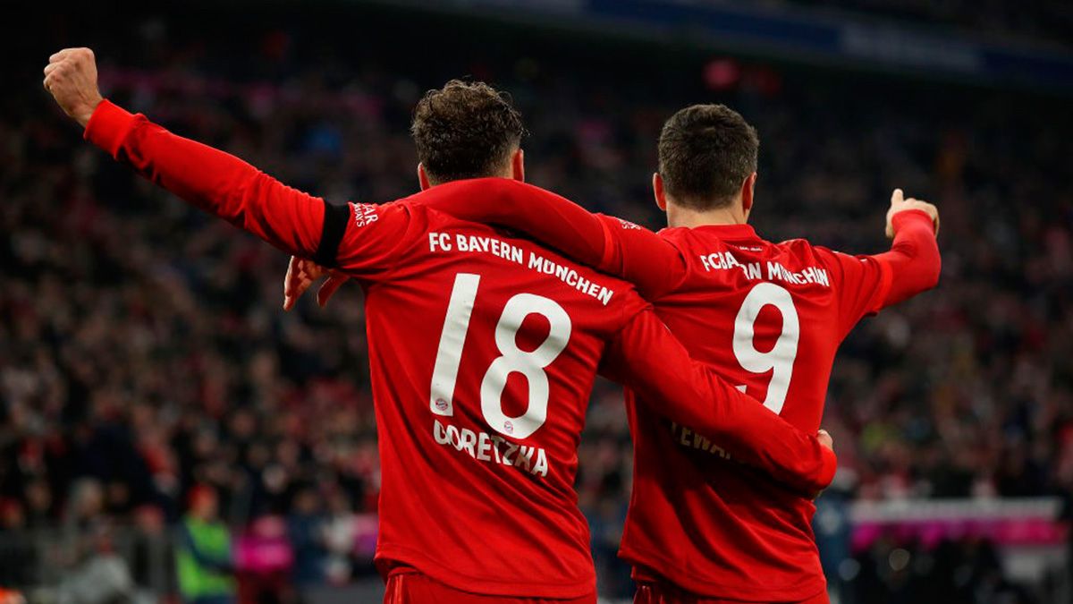 The players of Bayern Munich celebrate a goal in the Bundesliga