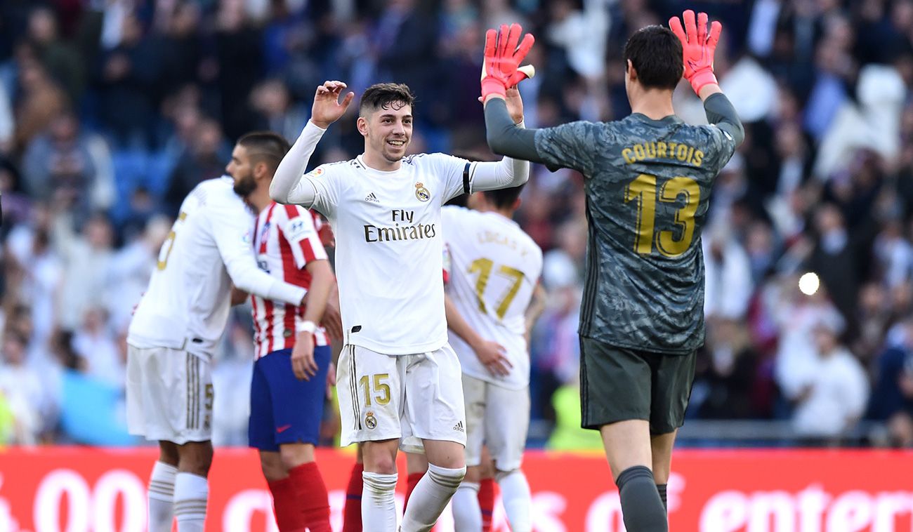 Los jugadores del Madrid celebran la victoria