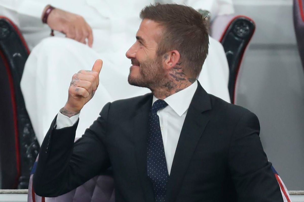 David Beckham greets in a loge