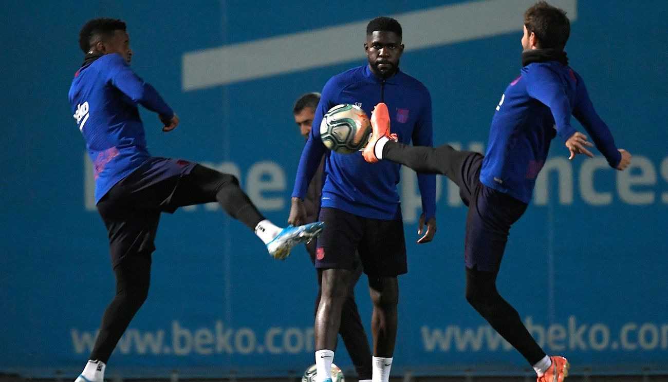 Samuel Umtiti y Nélson Semedo en un entrenamiento