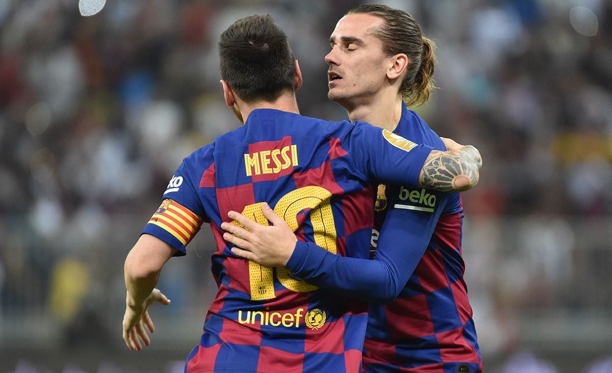 Leo Messi and Antoine Griezmann, celebrating a goal with the Barça