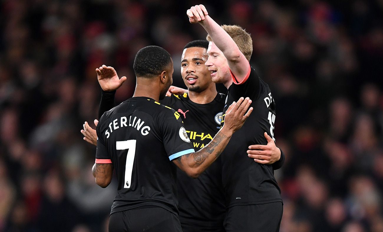Sterling, Of Bruyne and Gabriel Jesus celebrate a goal