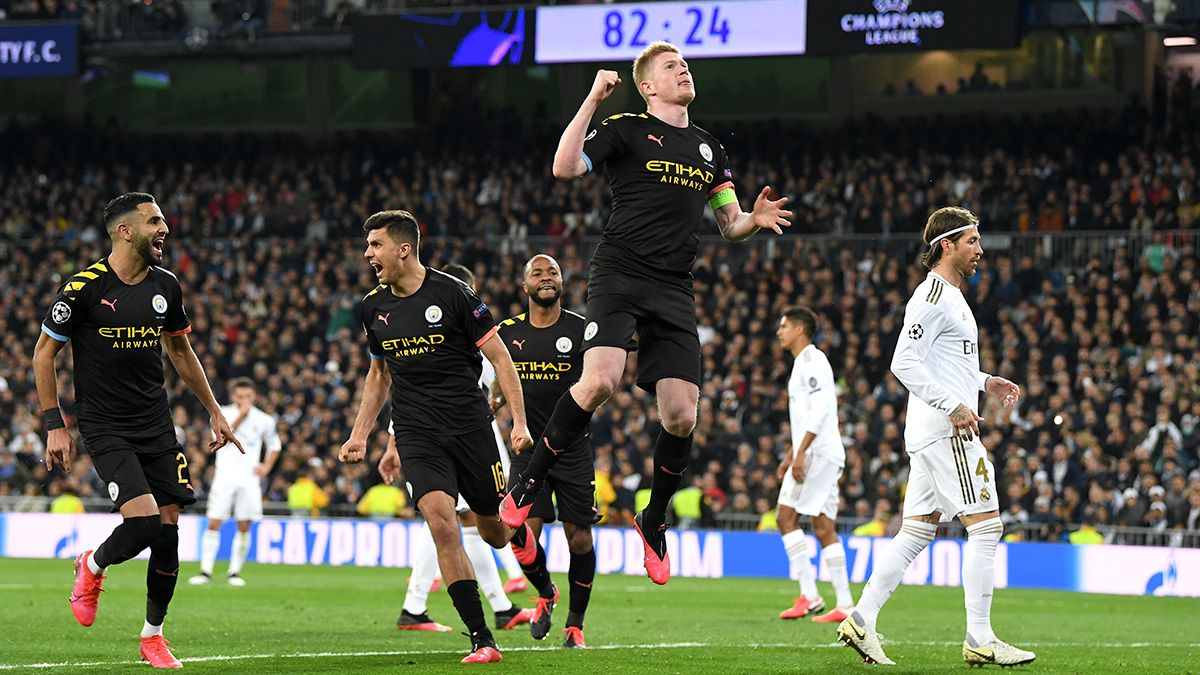 The players of Manchester City celebrate a goal against Real Madrid