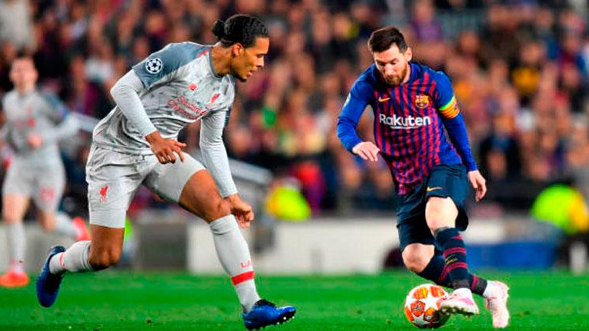 Virgil van Dijk y Leo Messi en un partido de la Champions League