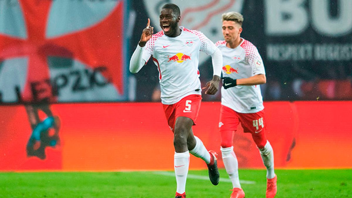 Dayot Upamecano celebrates a goal with Leipzig