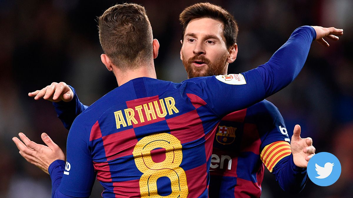 Arthur Melo, celebrating a goal with Leo Messi