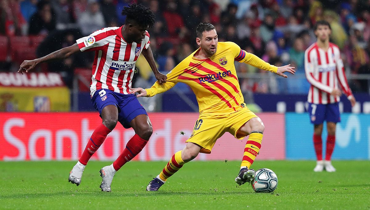 Messi and Thomas Partey struggle by the ball