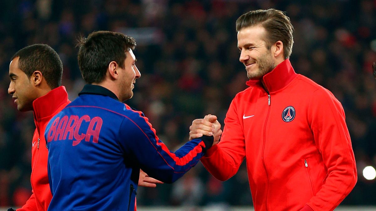 Leo Messi y David Beckham en un partido de la Champions League