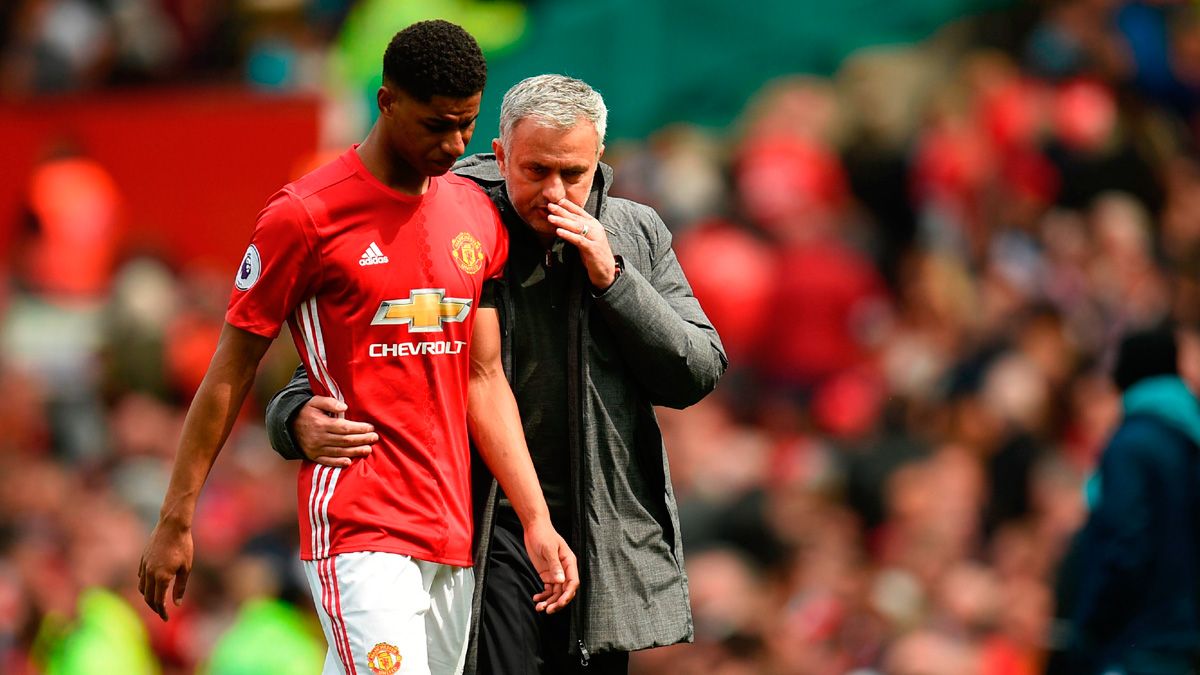Marcus Rashford and José Mourinho after a match of Manchester United
