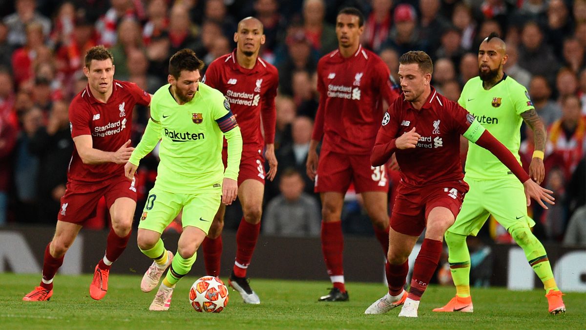 Leo Messi y Jordan Henderson en un Liverpool-Barça de la Champions League