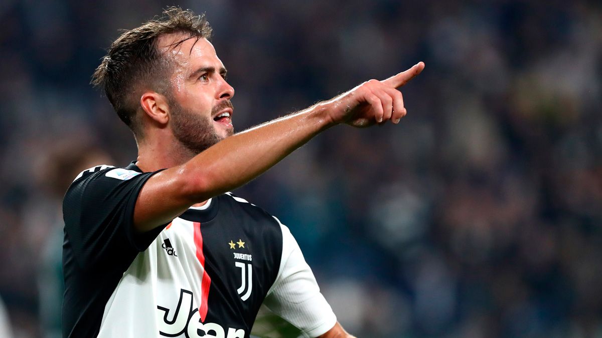 Miralem Pjanic celebrates a goal with Juventus in the Serie A
