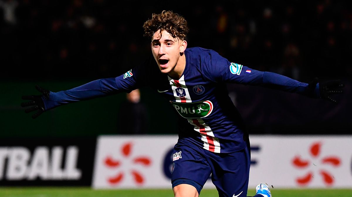 Adil Aouchiche celebrates a goal with PSG in the French Cup
