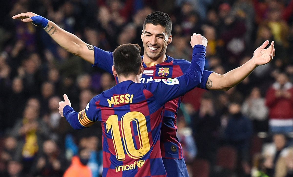 Leo Messi and Luis Suárez, celebrating a goal with the FC Barcelona