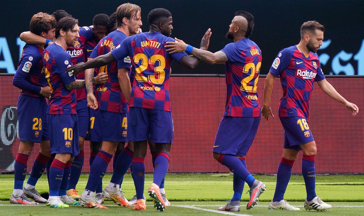 The players of the Barça celebrate a goal in Vigo