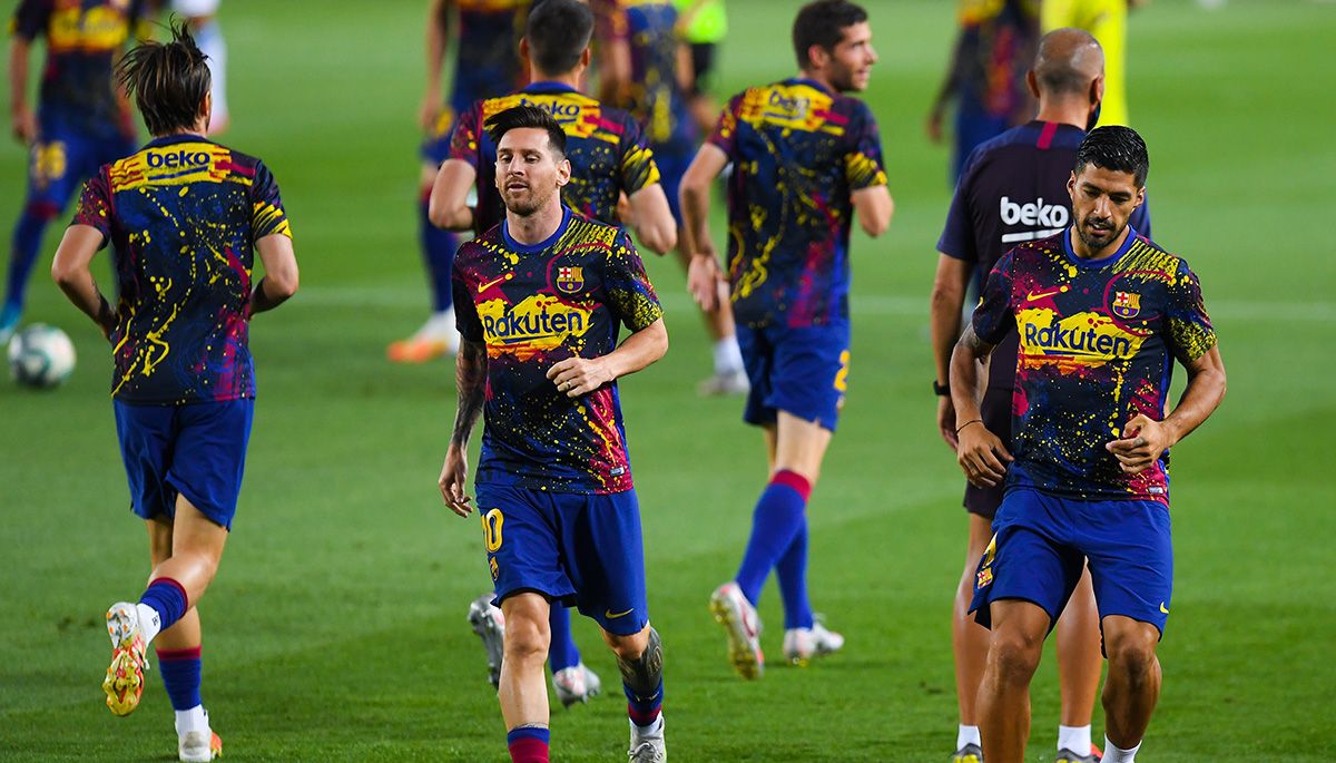 Leo Messi y Luis Suárez, durante un calentamiento con el FC Barcelona