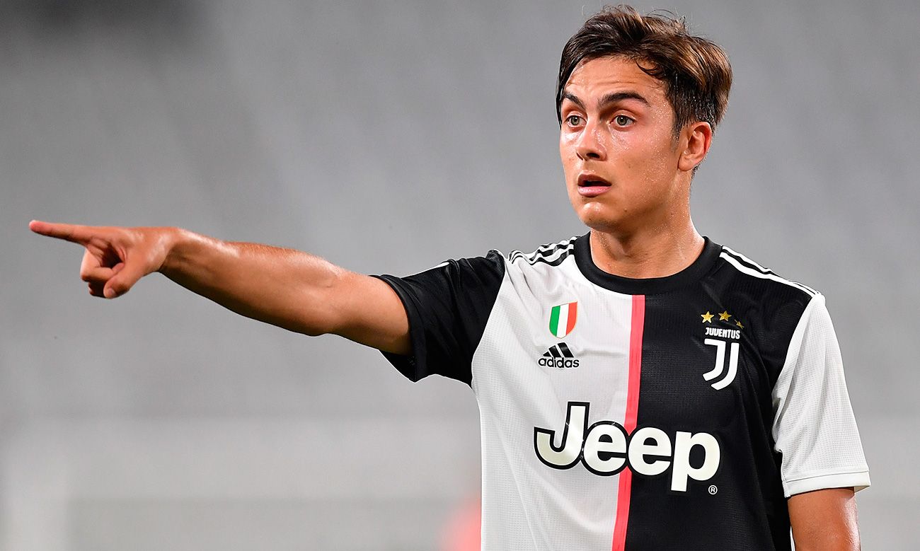 Paulo Dybala signals something in a party of the Juve