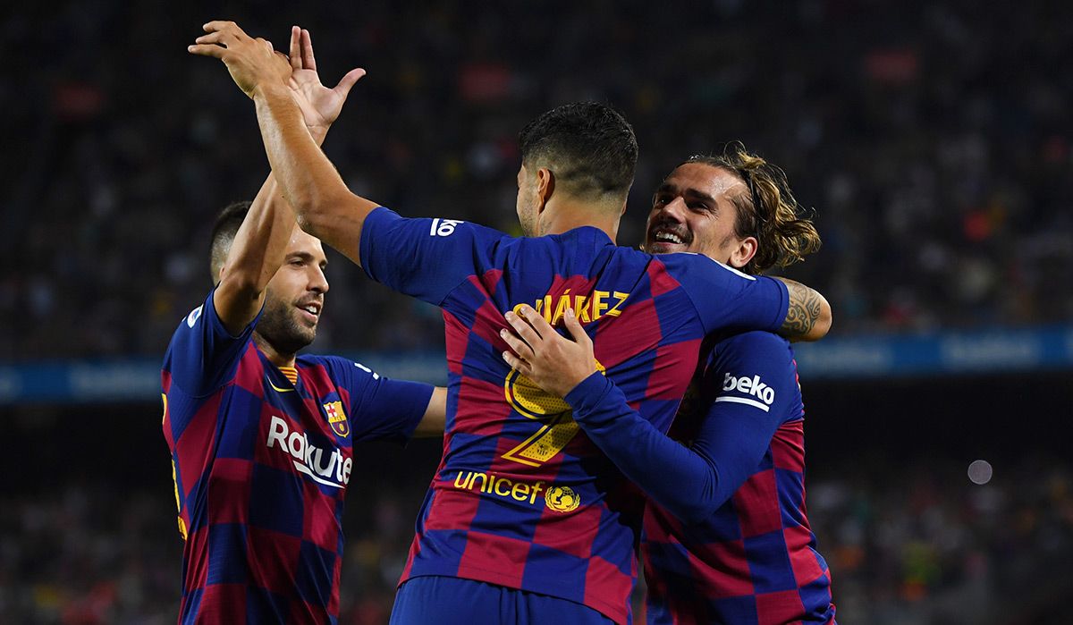 Jordi Alba, Luis Suárez y Antoine Griezmann, celebrando un gol con el Barça