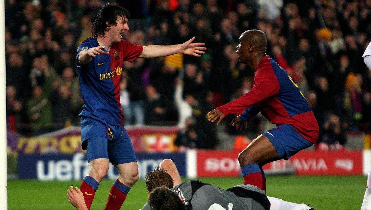 Messi and Eto'or celebrate a goal with the Barcelona
