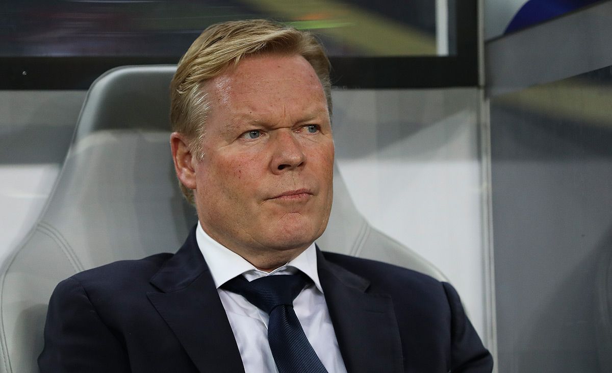 Ronald Koeman, seated in the bench of Holland
