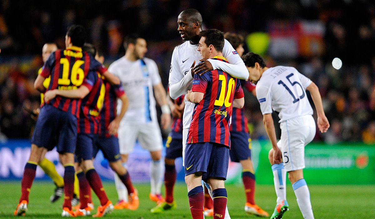 Leo Messi and Touré Yaya, embracing after a City-Barça