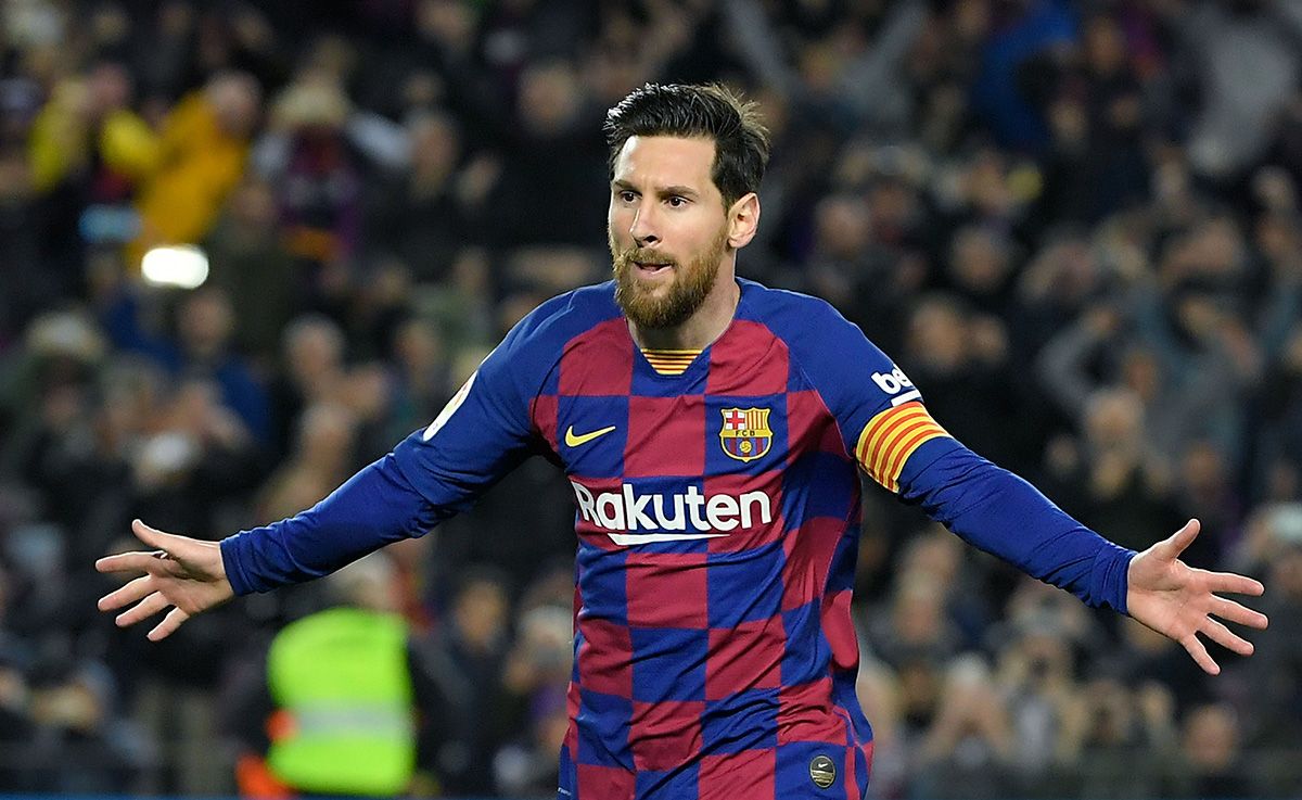 Leo Messi, celebrating a goal in the Camp Nou