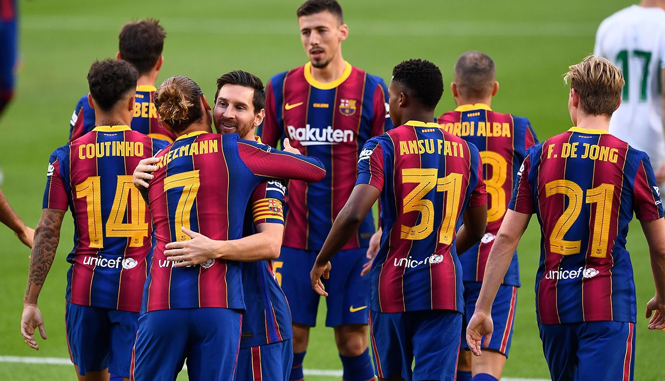 Los jugadores del Barça celebran un gol de Griezmann