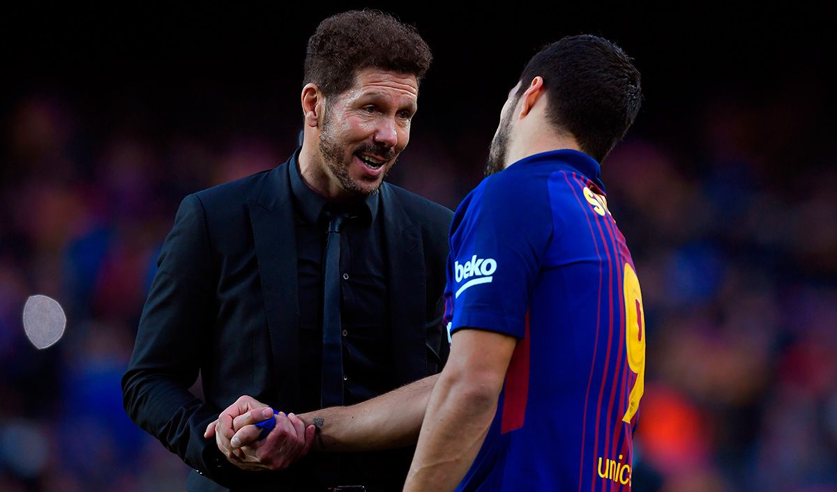 Luis Suárez and Diego Pablo Simeone, during a handshake