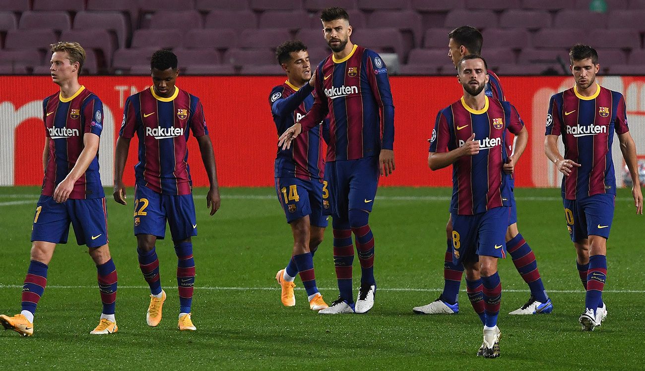 The players of the Barça celebrate a goal in Champions