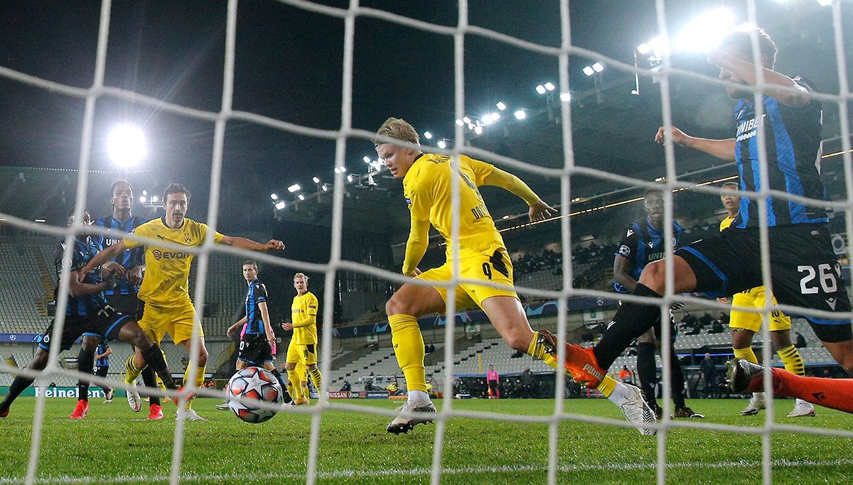 Erling Braut Haaland, scoring a goal against the Brugge