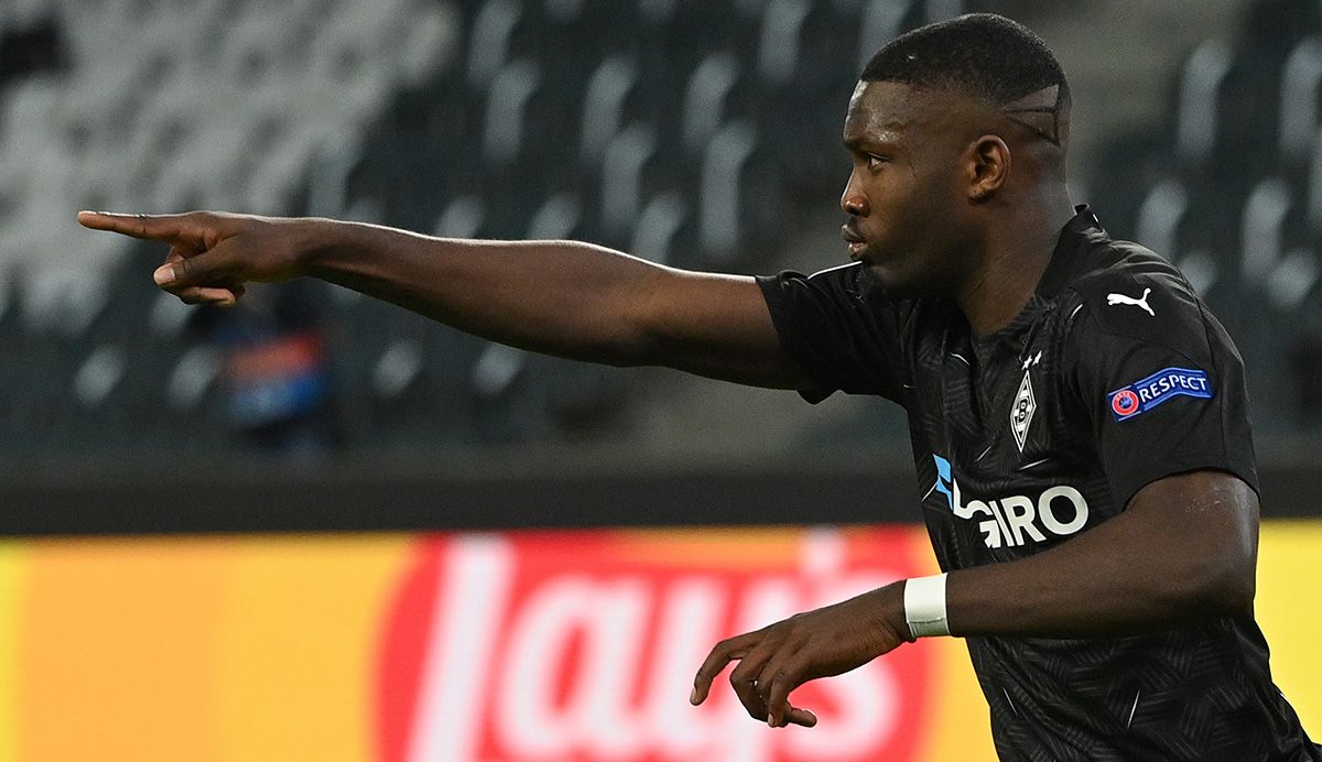 Marcus Thuram celebrating a goal in front of the Madrid