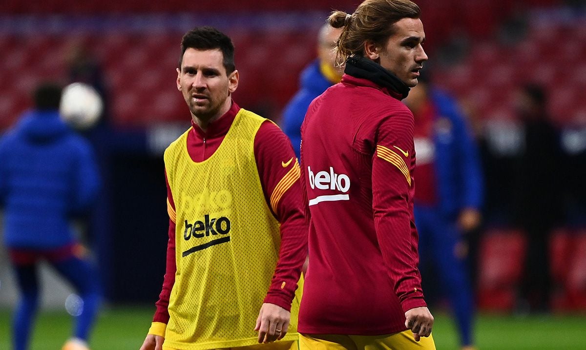 Leo Messi y Antoine Griezmann, durante un calentamiento