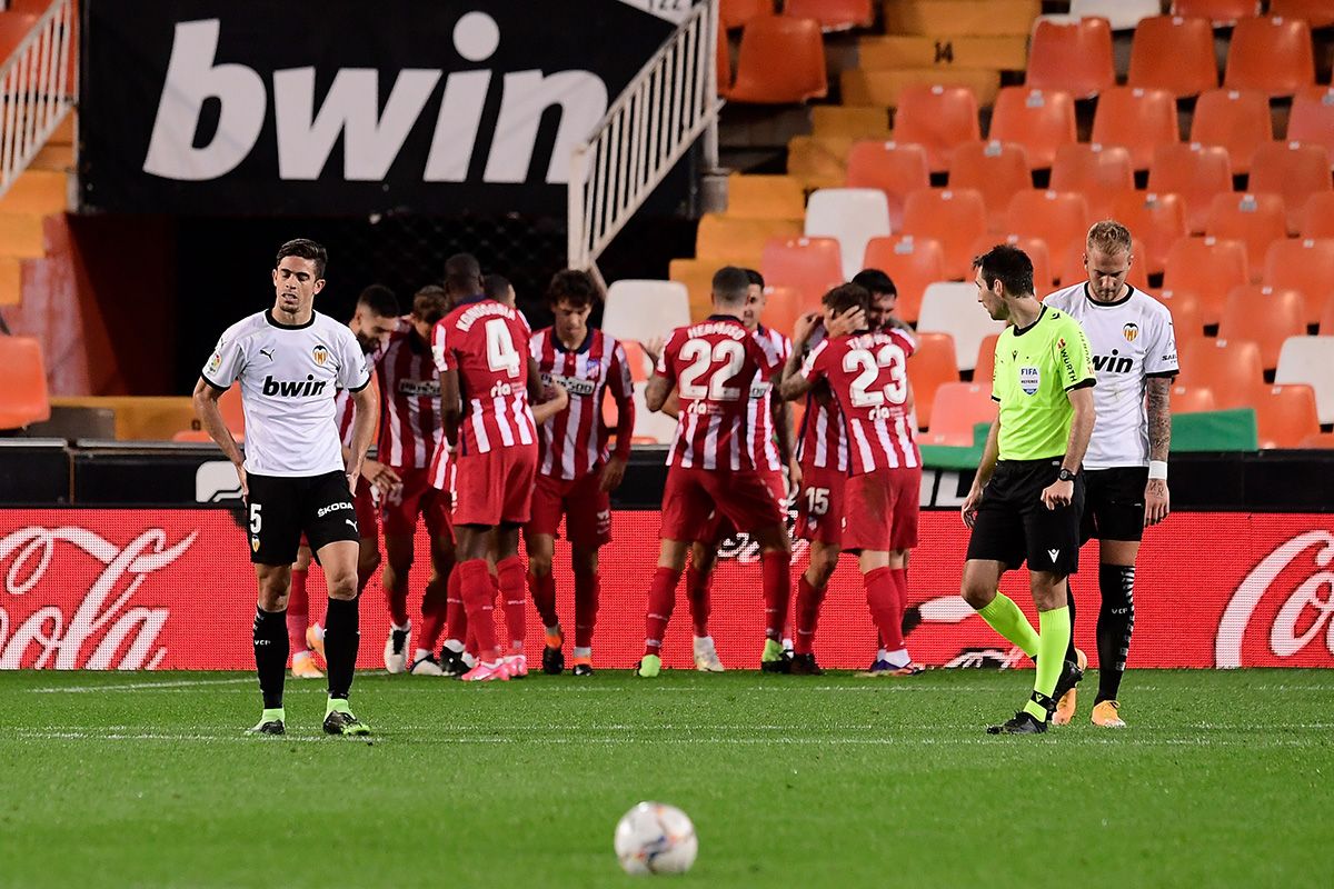 The Athletic of Madrid won to Valencia and follows colíder