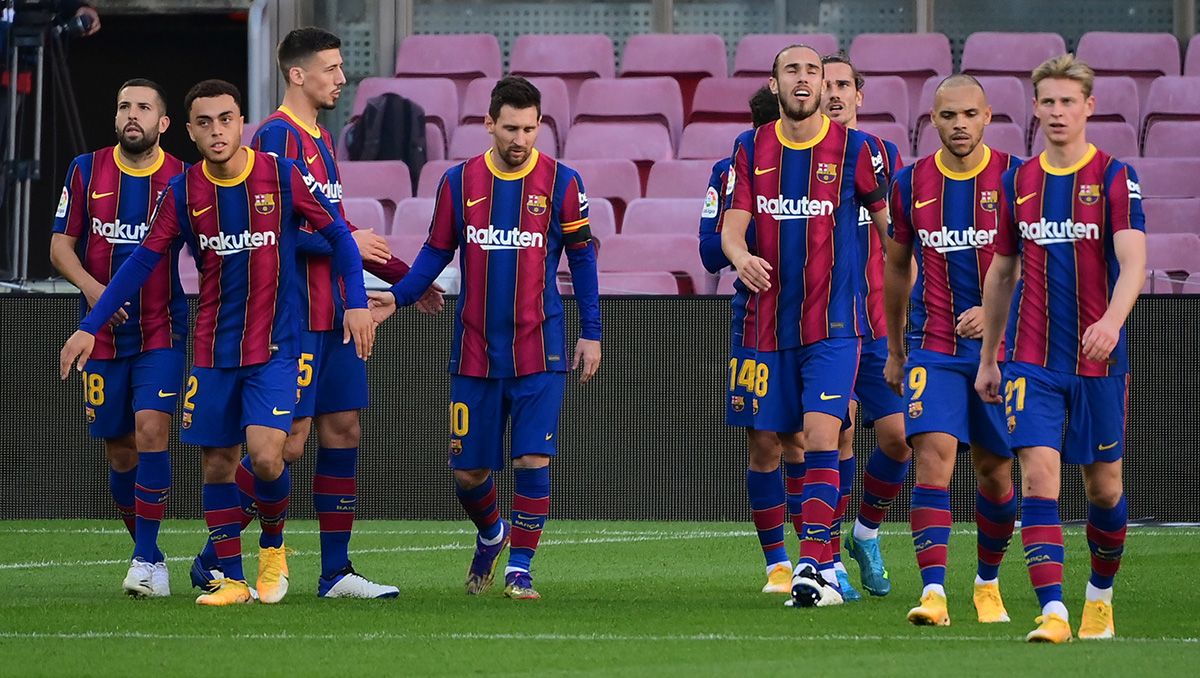 The players of the Barça celebrate a goal in League