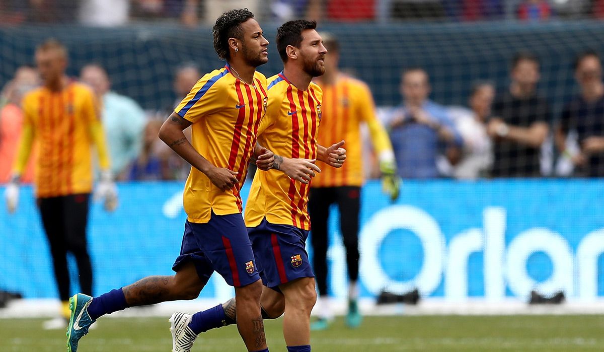 Neymar Jr y Leo Messi, durante un calentamiento con el Barça