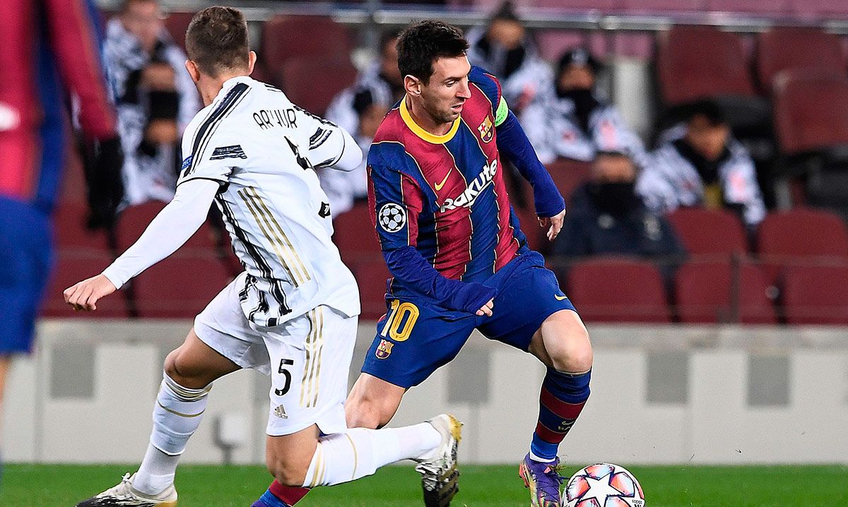 Arthur Melo y Leo Messi, durante el Barça-Juventus en el Camp Nou