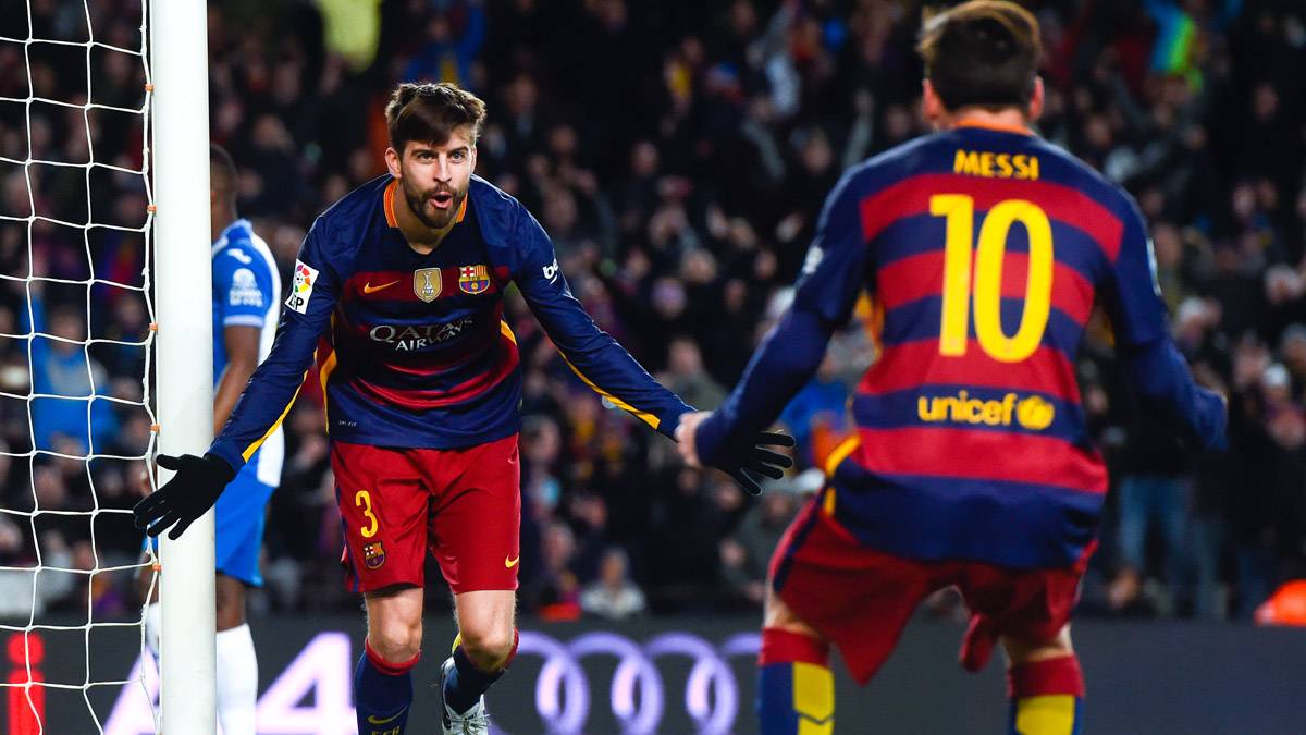 Piqué y Messi, celebrando un gol contra el Espanyol