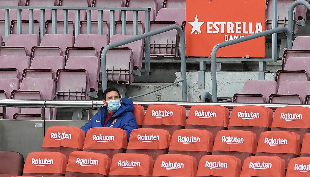 Leo Messi, seated in the terracing of the Camp Nou