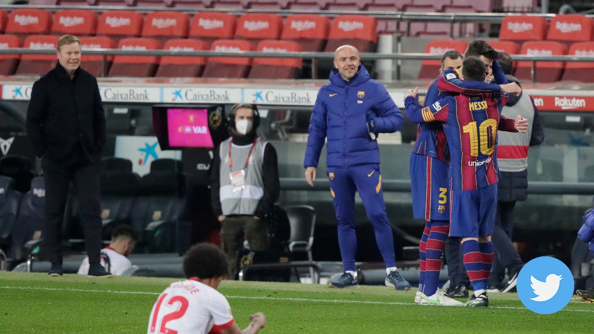 Messi y Piqué despues del partido contra el Sevilla