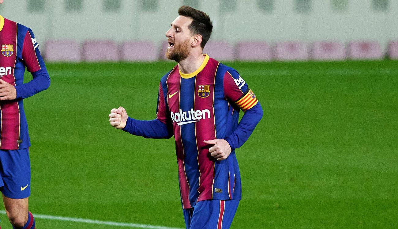 Leo Messi celebrates one of his goals in front of the Huesca