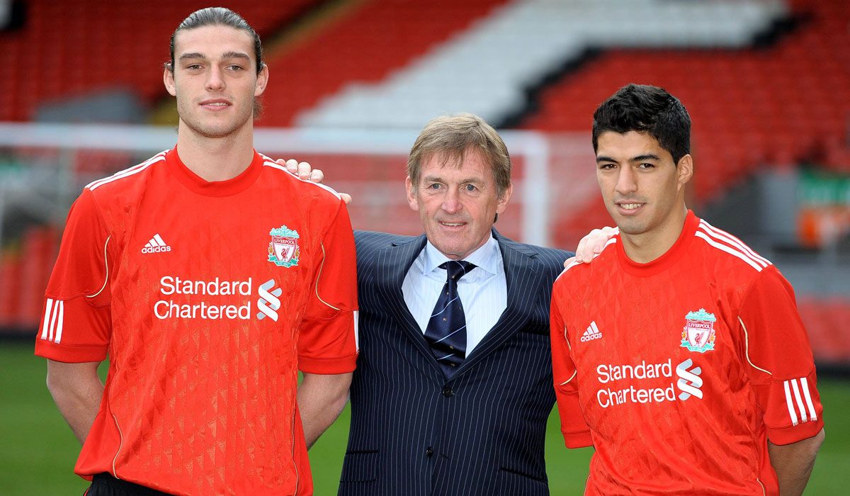 Andy Carroll and Luis Suárez in his arrival to the Liverpool