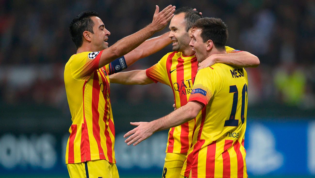 Messi, Iniesta y Xavi celebrando un gol con el Barça