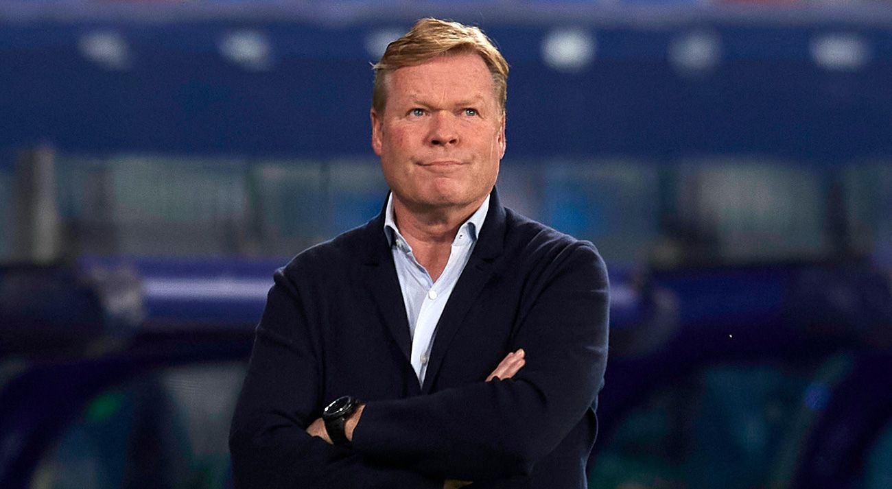 Ronald Koeman in front of the Raise