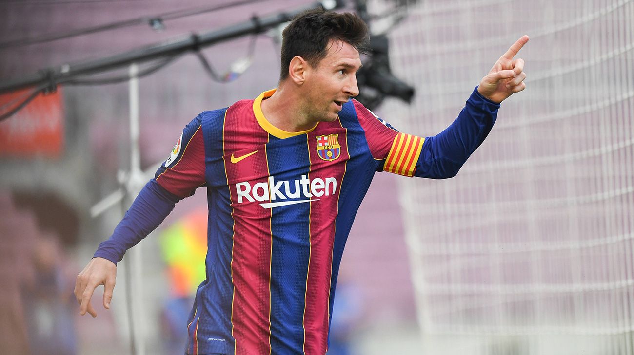 Leo Messi celebrates a goal with the Barcelona