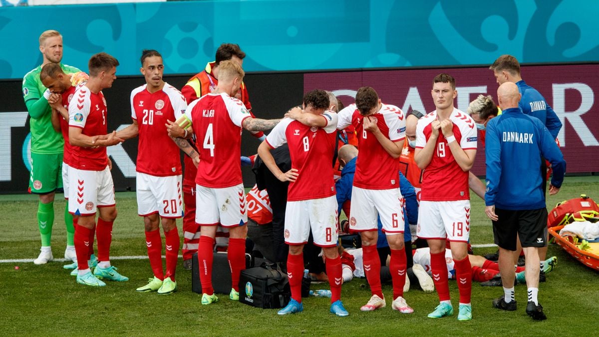 The players of Denmark while Christian Eriksen was attended