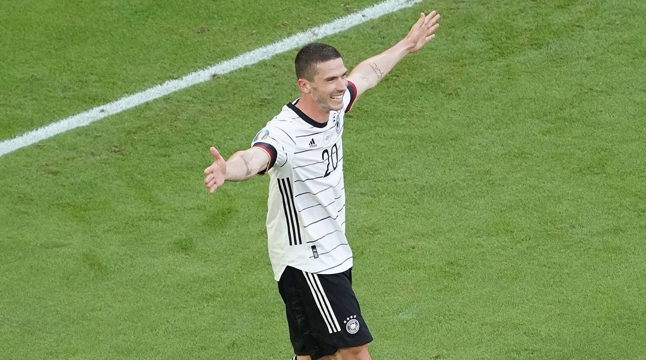 Robin Gosens celebrates a goal with Germany