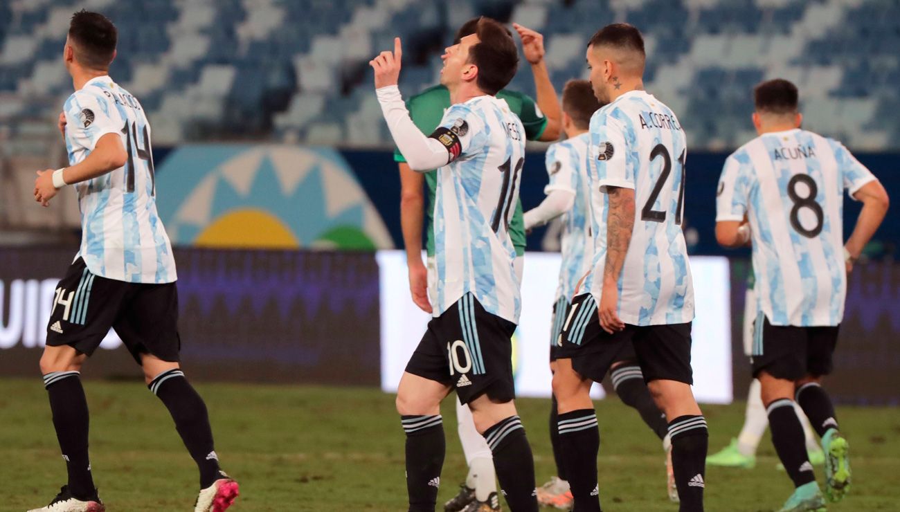 Leo Messi celebrates a goal with Argentina