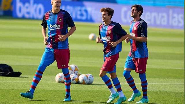 Sergi Roberto and Riqui Puig work