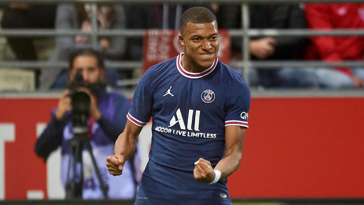 Mbappé, celebrating a goal in front of the Reims