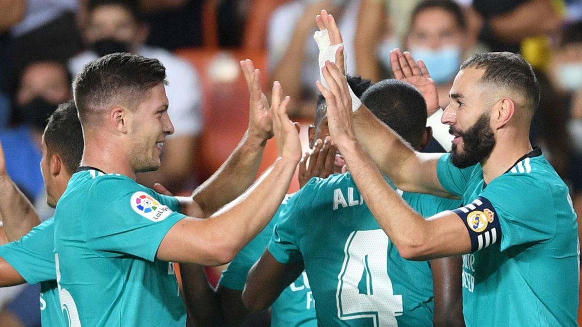 Luka Jovic and Karim Benzema celebrating a goal against Valencia