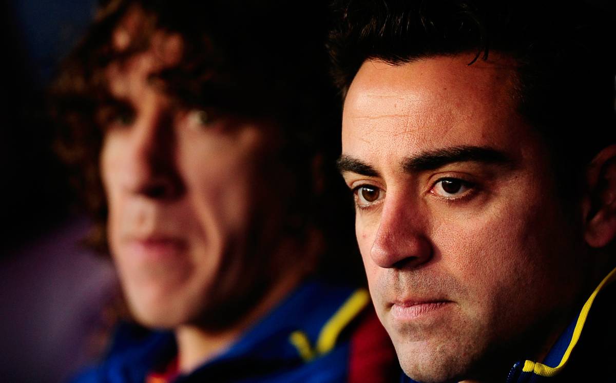 Carles Puyol and Xavi Hernández in his stage like players of the Barça